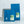 Two blue coffee bags with 'River Coffee' branding on a speckled white background